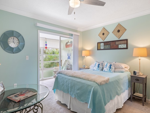 bedroom with a textured ceiling, light carpet, ceiling fan, and crown molding