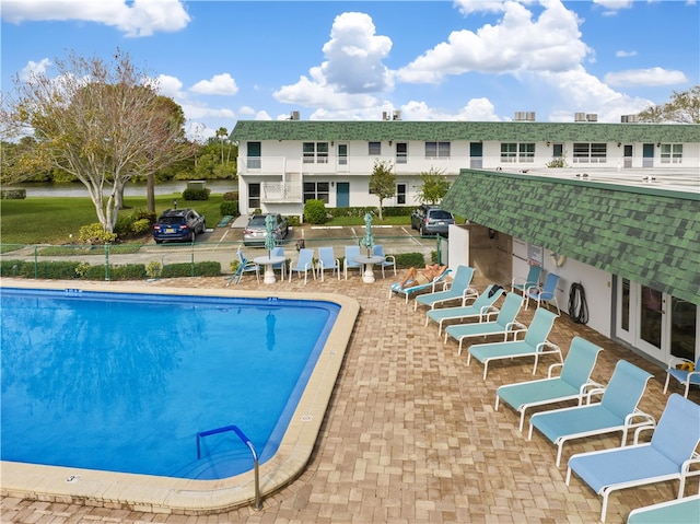 view of pool featuring a patio