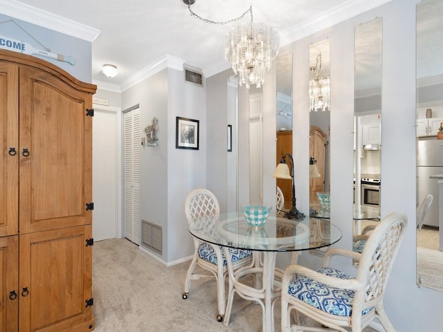 2800 Indian River Blvd Unit M7, Vero Beach, FL 32960 - dining room featuring a chandelier, ornamental molding, light carpet, and baseboards