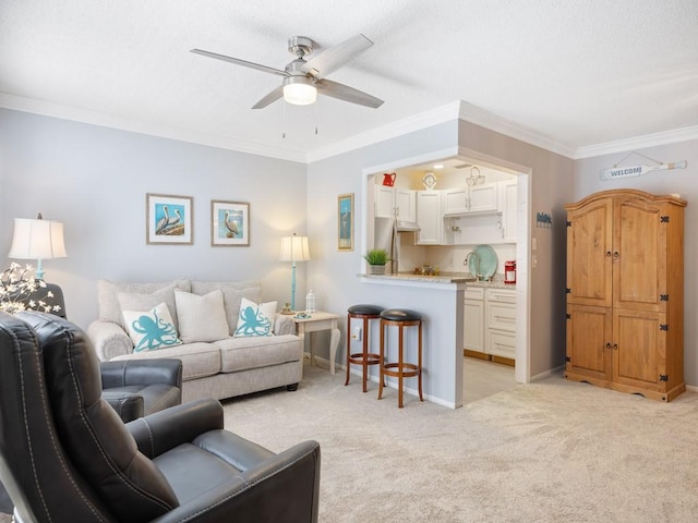 2800 Indian River Blvd Unit M7, Vero Beach, FL 32960 - living room with light carpet, a ceiling fan, crown molding, and baseboards