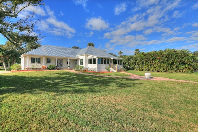 ranch-style home with a porch and a front lawn