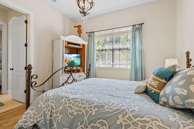 bedroom featuring hardwood / wood-style floors