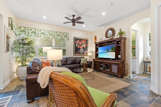 living room featuring ceiling fan