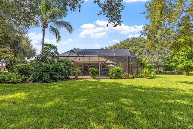 view of yard with a lanai