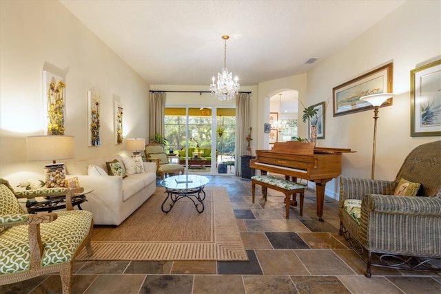 sitting room featuring a chandelier