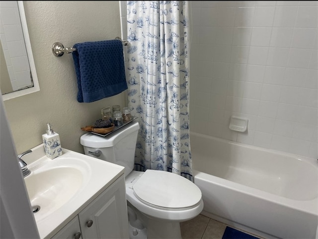 full bathroom with tile patterned flooring, shower / bath combination with curtain, vanity, and toilet