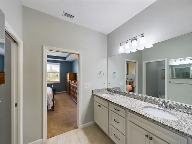 bathroom featuring vanity and tile patterned floors