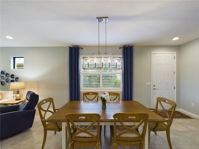 tiled dining area featuring plenty of natural light