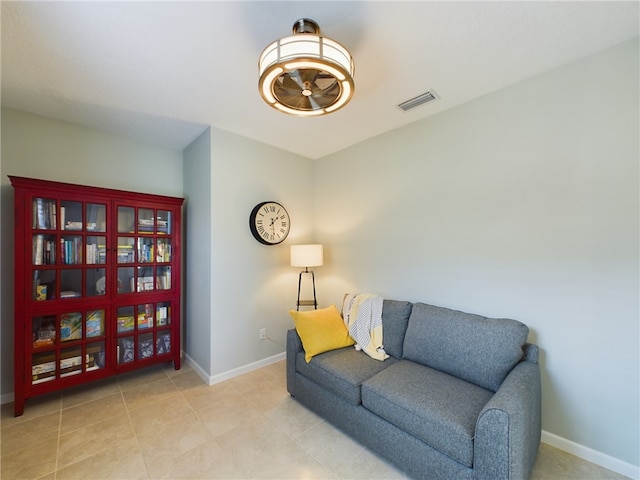 living area with light tile patterned flooring