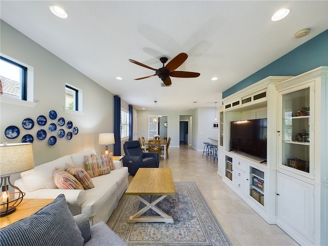 living room featuring ceiling fan