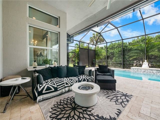 view of patio featuring glass enclosure and an outdoor living space