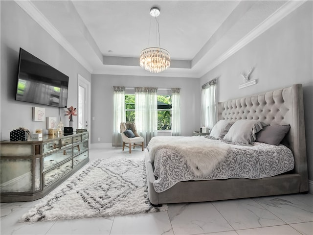 bedroom featuring a chandelier, crown molding, and a tray ceiling