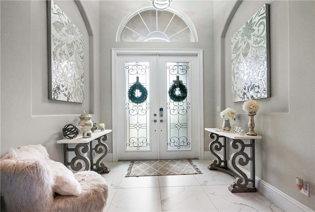 entrance foyer featuring french doors