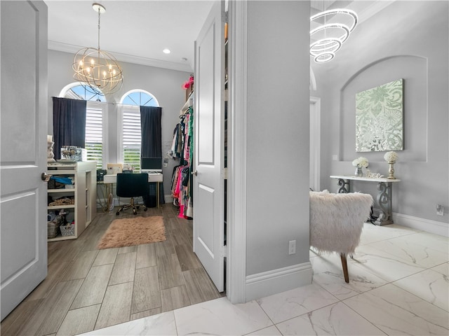 interior space with an inviting chandelier and light hardwood / wood-style flooring