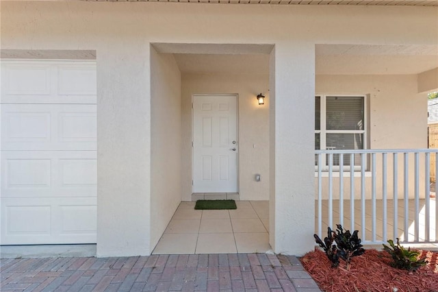 doorway to property with a porch