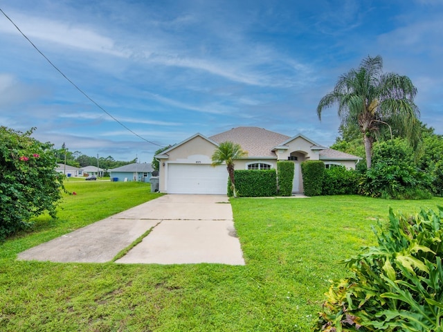 single story home featuring a front lawn and a garage