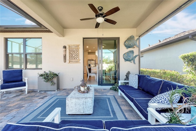 view of patio / terrace with an outdoor hangout area and ceiling fan