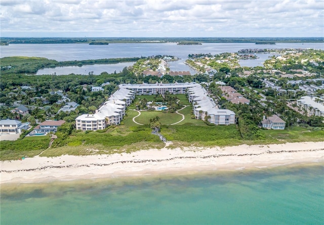 aerial view featuring a water view and a view of the beach