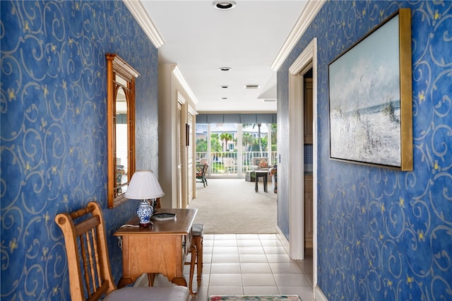 hall featuring light colored carpet and ornamental molding