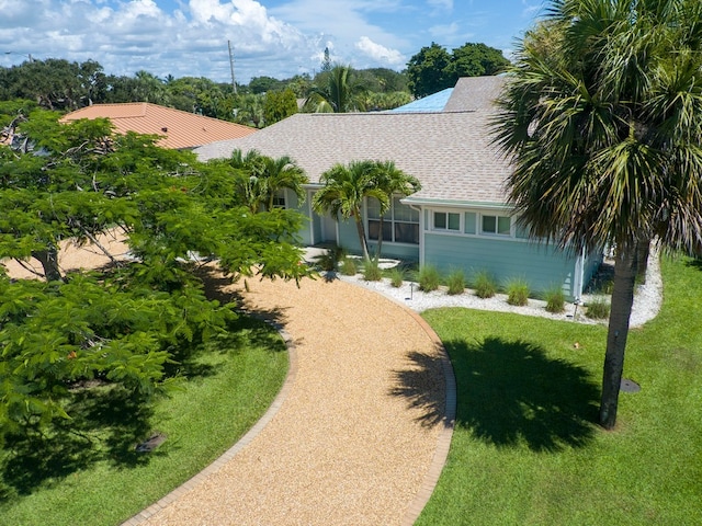 exterior space featuring a front lawn