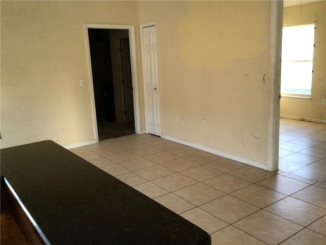 view of tiled spare room