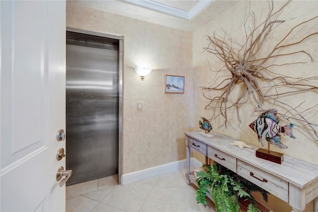 interior space with tile patterned floors and ornamental molding