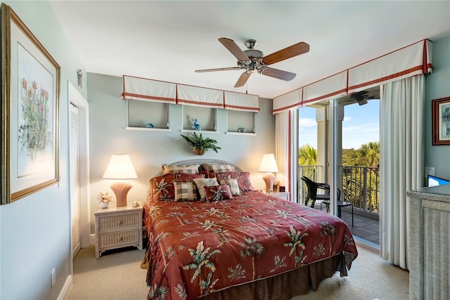 carpeted bedroom featuring access to outside and ceiling fan