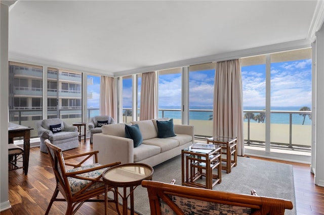 3554 Ocean Dr Unit 403S, Vero Beach, FL 32963 - living area with a water view, wood finished floors, and expansive windows