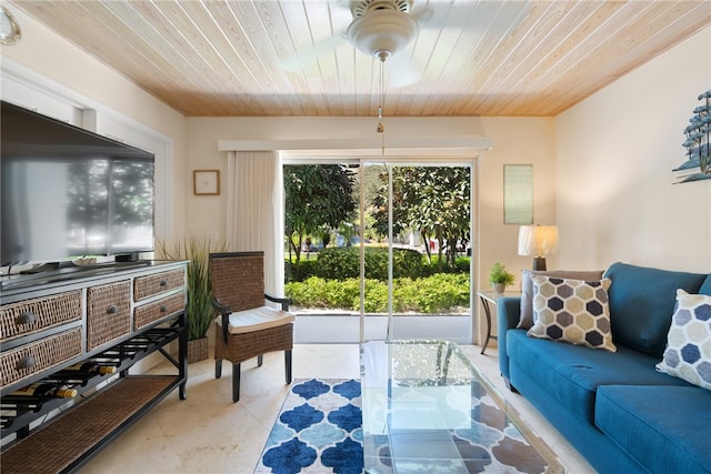 tiled living room featuring wooden ceiling and plenty of natural light