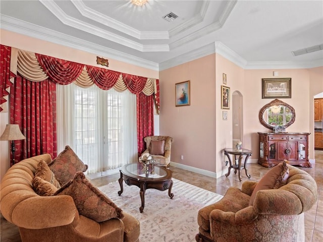 5305 Southwind Trl, Fort Pierce, FL 34951 - living area featuring visible vents, arched walkways, a raised ceiling, and ornamental molding
