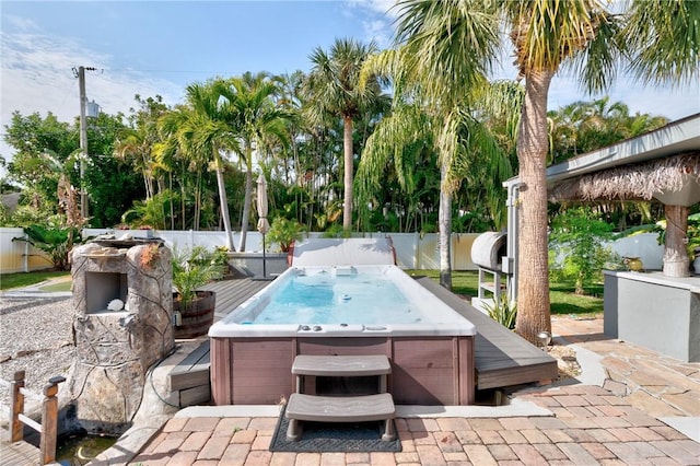 view of patio featuring a hot tub