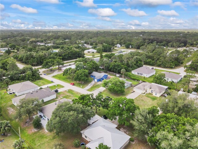 9335 103rd Ave, Vero Beach, FL 32967 - aerial perspective of suburban area featuring a forest