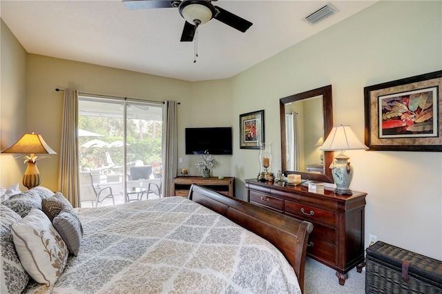 carpeted bedroom featuring ceiling fan and access to outside