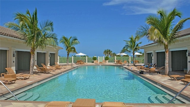 104 Island Plantation Ter Unit 304, Vero Beach, FL 32963 - community pool featuring fence and a patio area