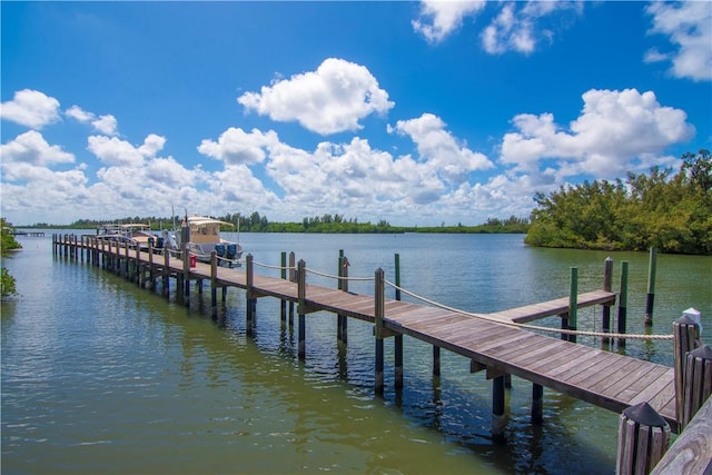 104 Island Plantation Ter Unit 304, Vero Beach, FL 32963 - view of dock featuring a water view