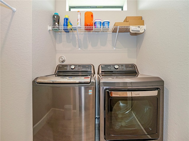 laundry room with separate washer and dryer