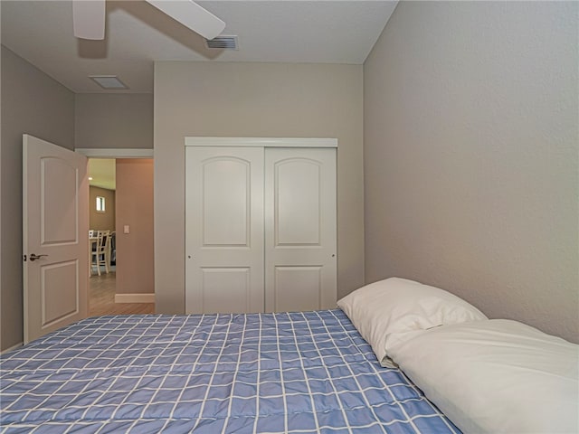 bedroom with a closet and ceiling fan