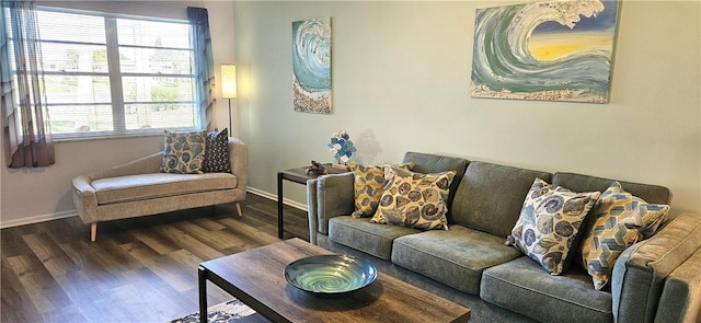 living area featuring dark wood-style floors and baseboards