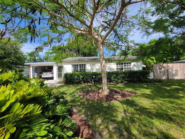 2136 33rd Ave, Vero Beach, FL 32960 - view of front facade with a carport