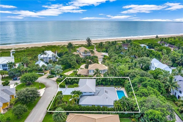 drone / aerial view with a view of the beach and a water view