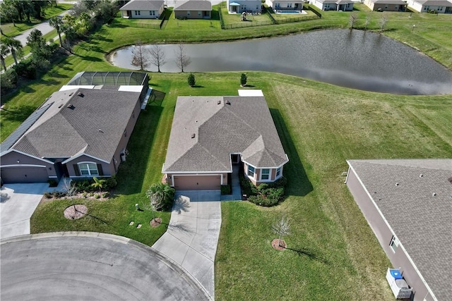 bird's eye view with a water view