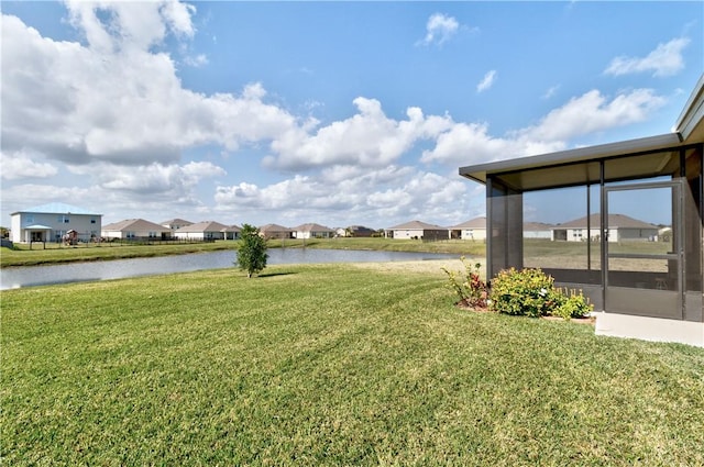 view of yard featuring a water view