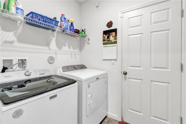 laundry area featuring washer and clothes dryer