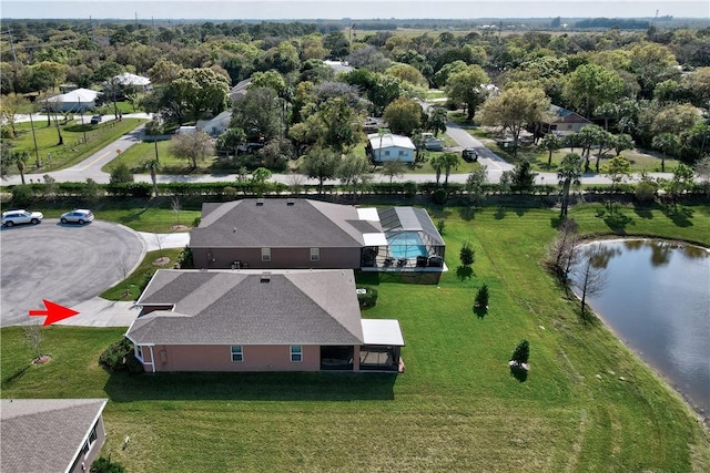 drone / aerial view featuring a water view