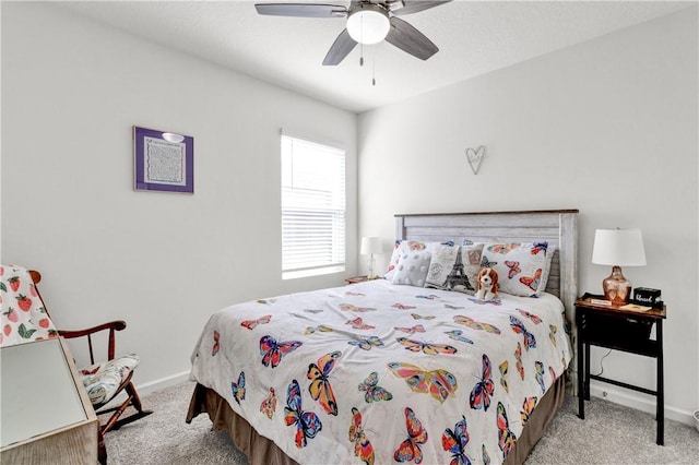 bedroom featuring ceiling fan and carpet flooring