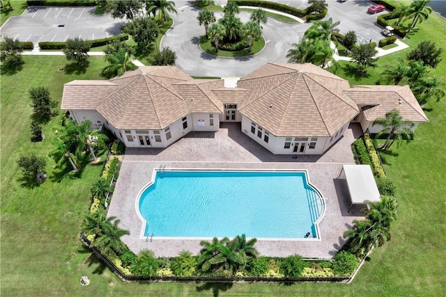 view of swimming pool featuring a patio area