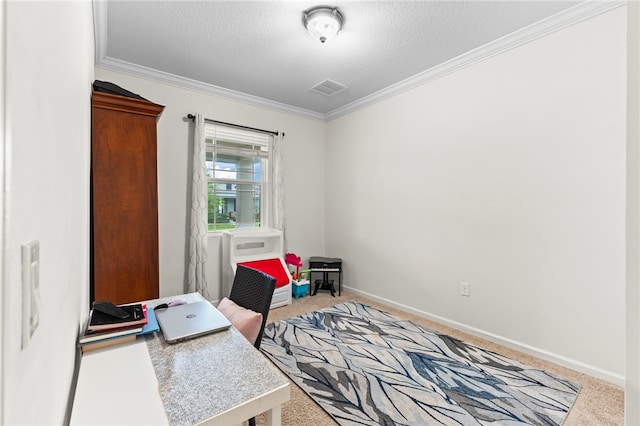 office with visible vents, light colored carpet, and crown molding