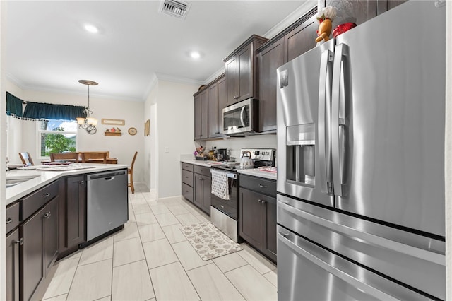 kitchen with visible vents, dark brown cabinets, crown molding, light countertops, and stainless steel appliances