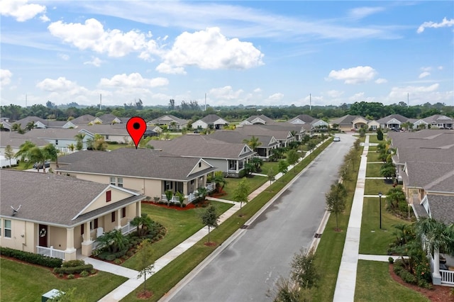 drone / aerial view featuring a residential view