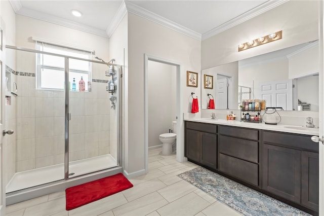 full bath featuring a shower stall, crown molding, and a sink